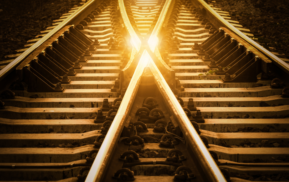 Train tracks to represent switching from woocommerce to Shopify 